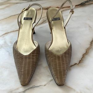 Simple and elegant gold sling back heels by Stuart Weitzman.